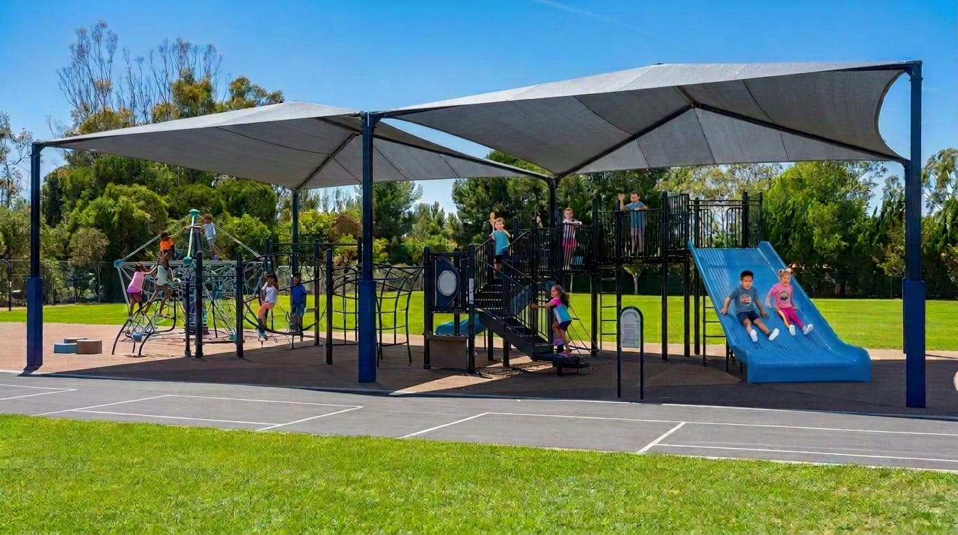 Children playing on the bright new Eastbluff Elementary playground