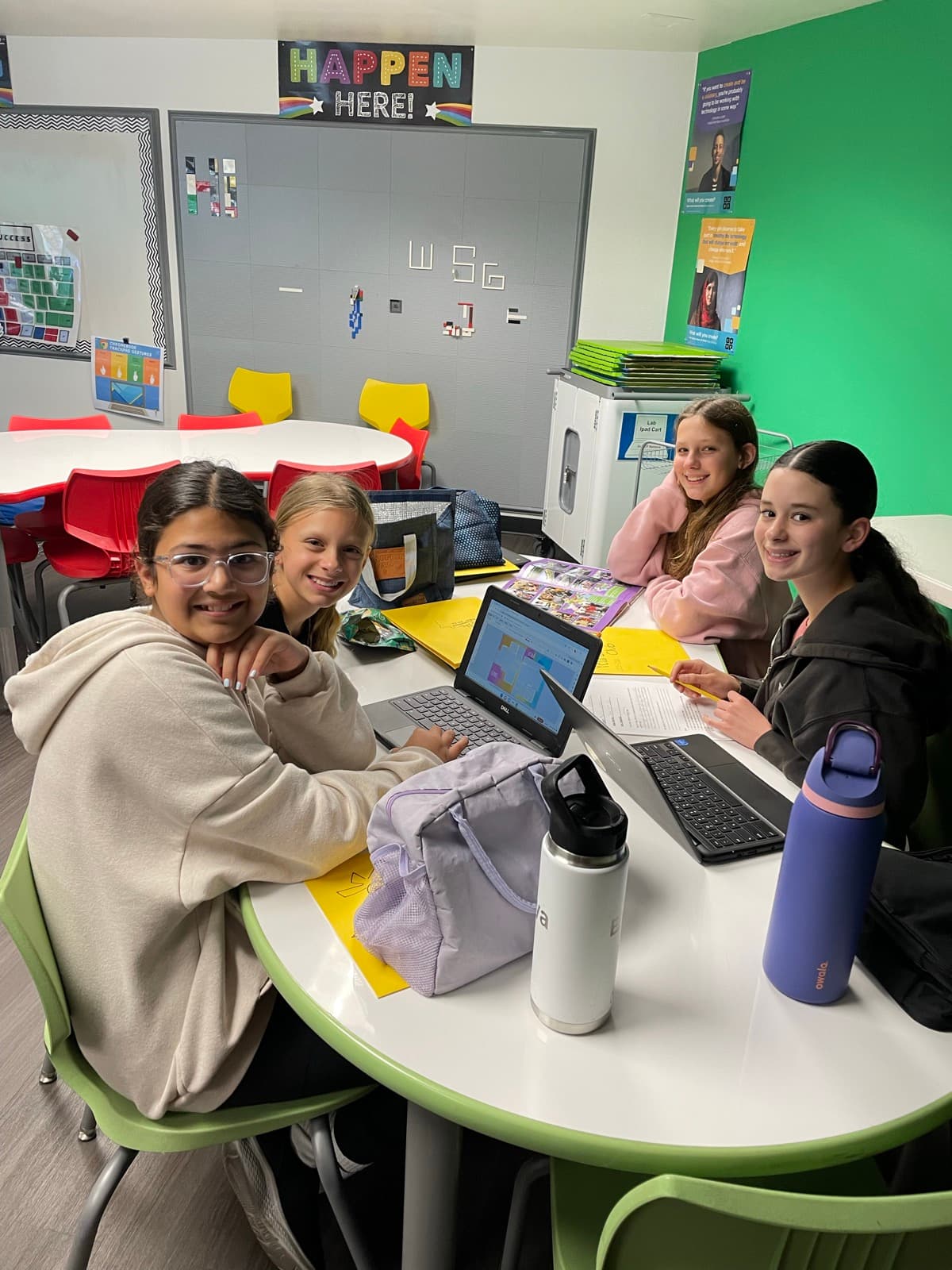 Eastbluff students working together on laptops in the Otter Lab